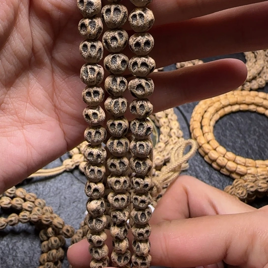 舟***游柏香籽/百香籽吊坠