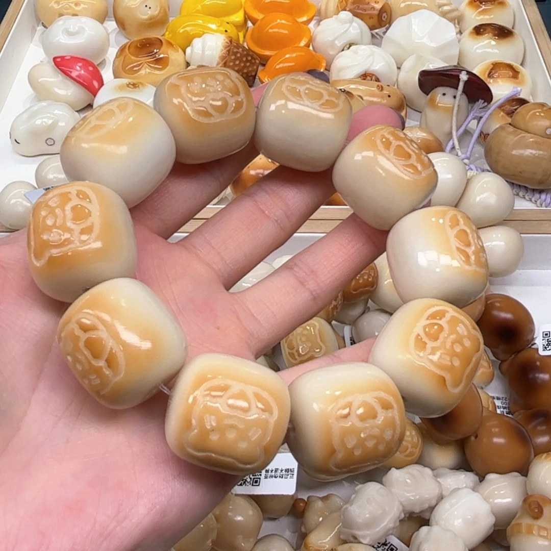 手串菩提根/象牙果9.8.1象牙果小熊桶珠微瑕