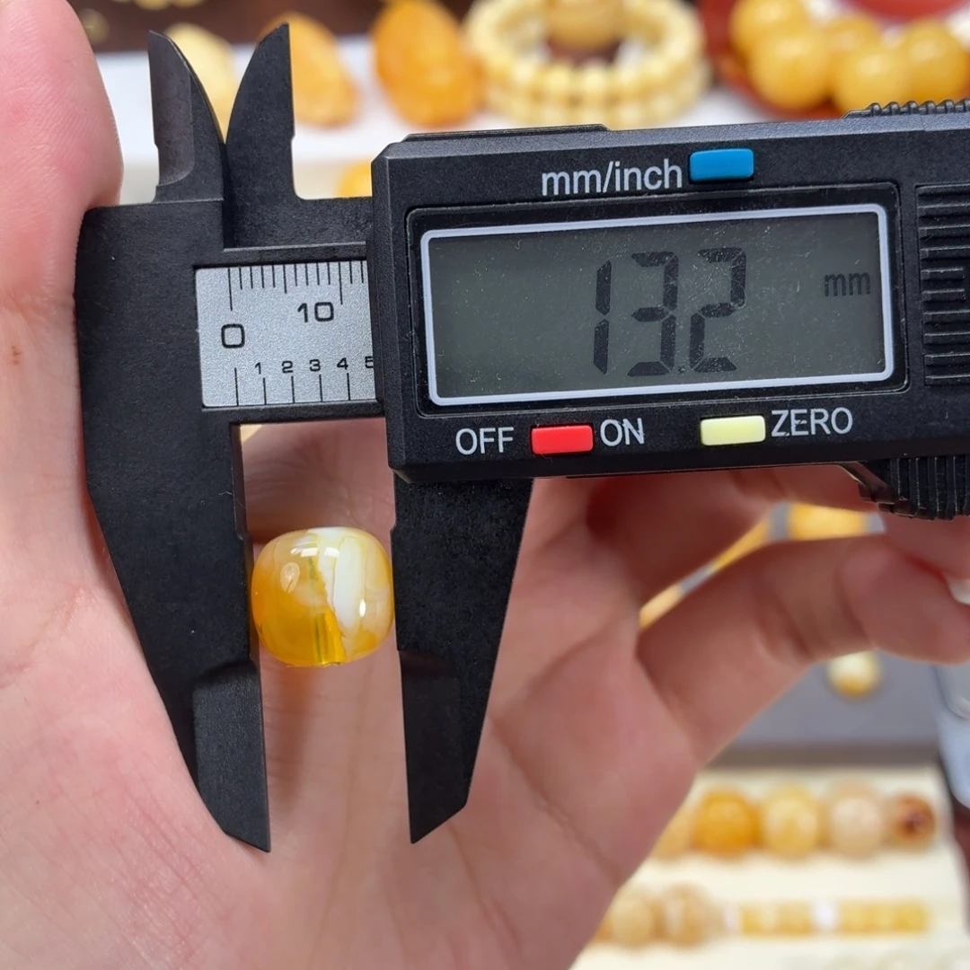 琥珀未镶嵌裸石焦皮金橘白溶洞老型13.2mm