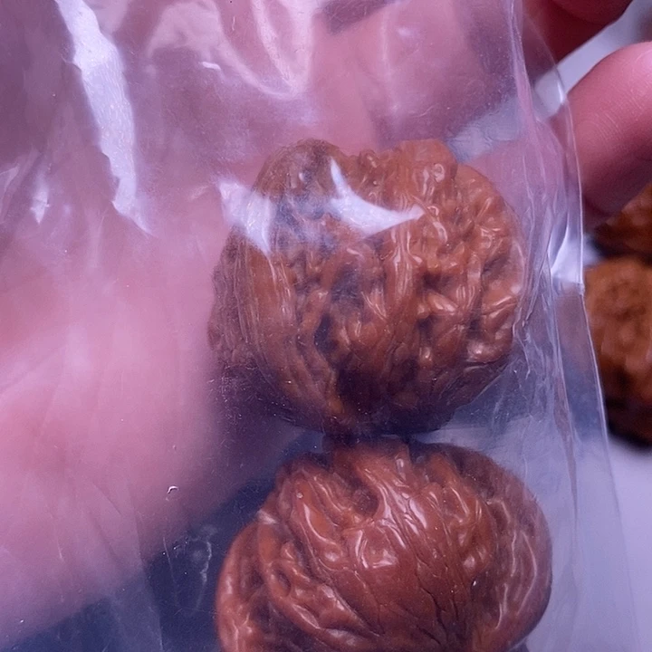 ****子文玩核桃吊坠磨盘