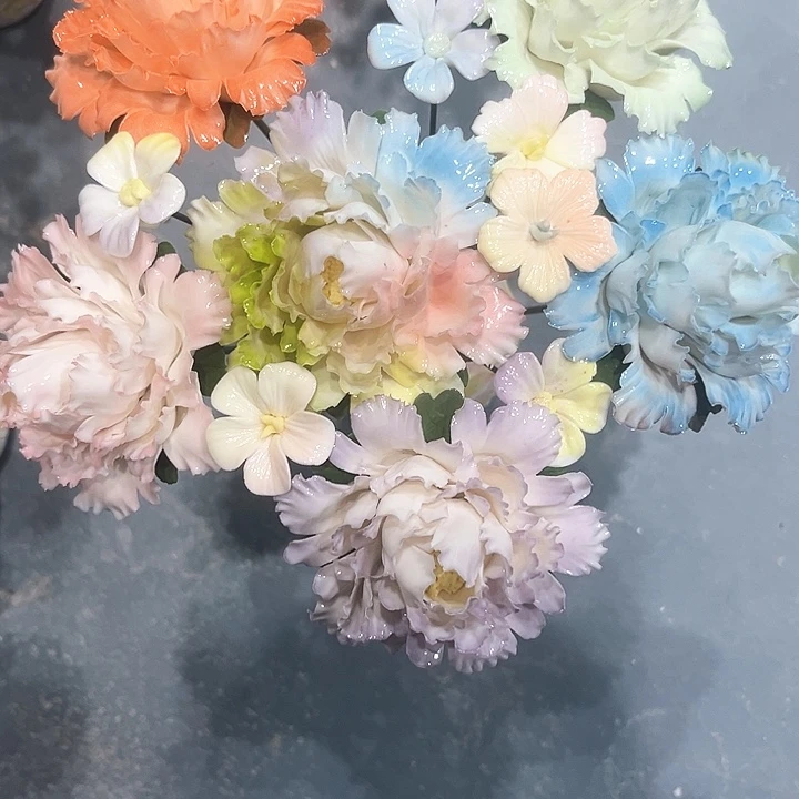 阿***倩陶瓷花花摆件，花束