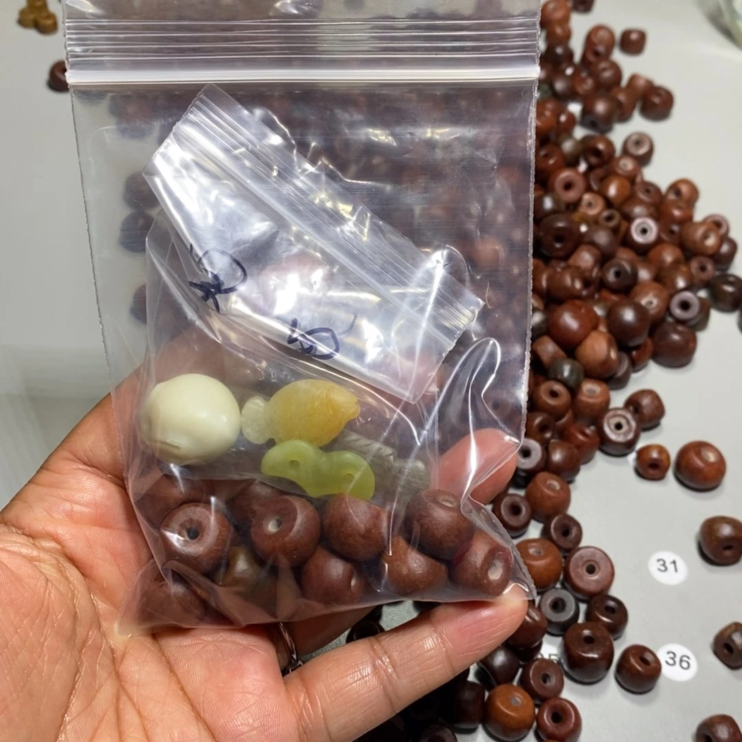 岫岩河磨玉（透闪石质玉）未镶嵌颈饰桑*果