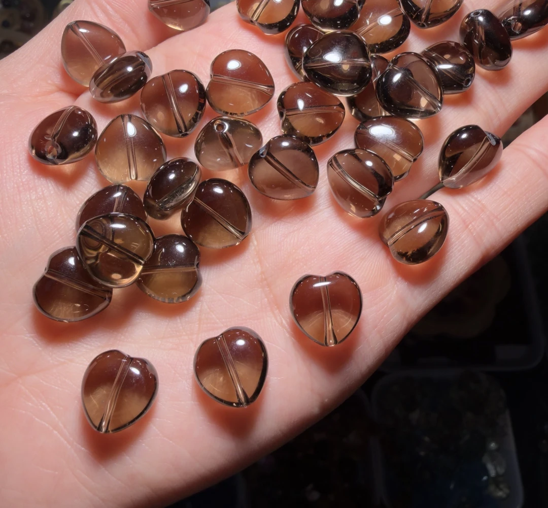 特级全净体茶水晶爱心珠一颗宽12mm厚7mm