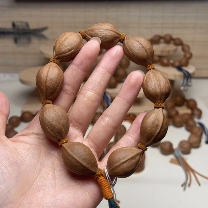 刘***泽橄榄核手串/手链18.29精品梅林铁核
