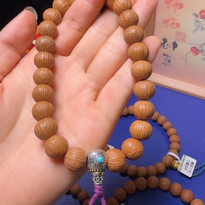 N***n猴头核桃手串凤羽