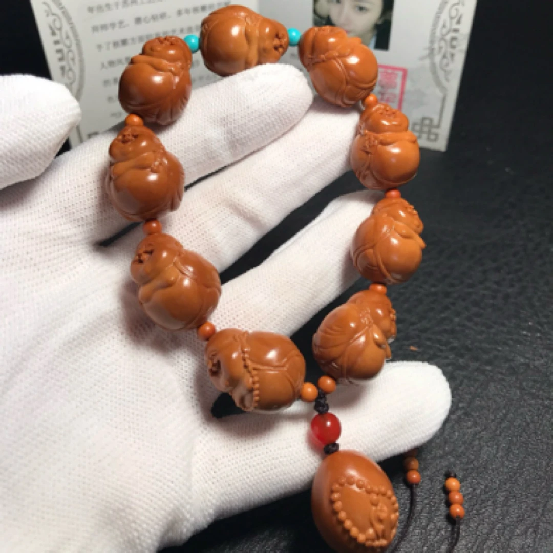 苏工橄榄核雕刻小籽弥勒佛手串尺寸1.6*2.1cm文玩招财纳福带证书