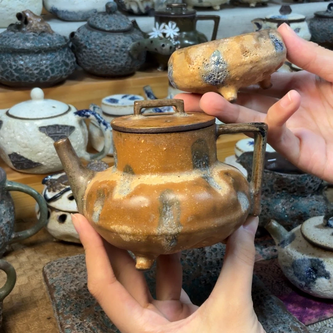 椿几许一壶带一杯