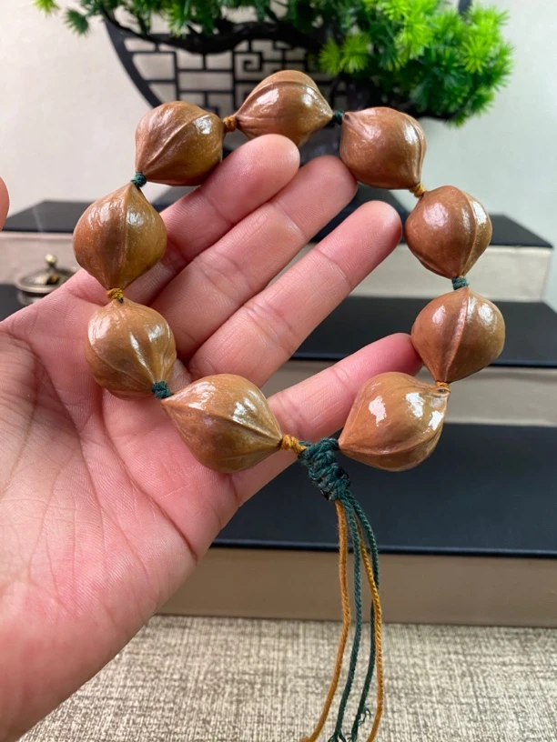 橄榄核2.1铁蒜头原皮手串鲨鱼背