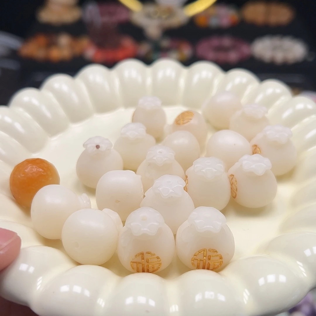 菩提根/象牙果手串10颗描金钱袋有裂瑕