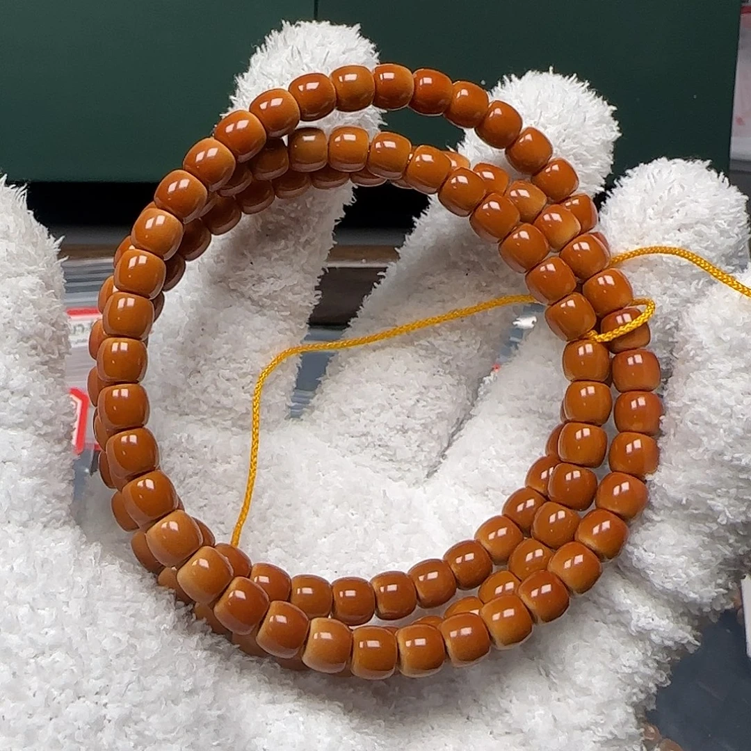 吊坠橄榄核7.0mm正三花面无白核尖长串