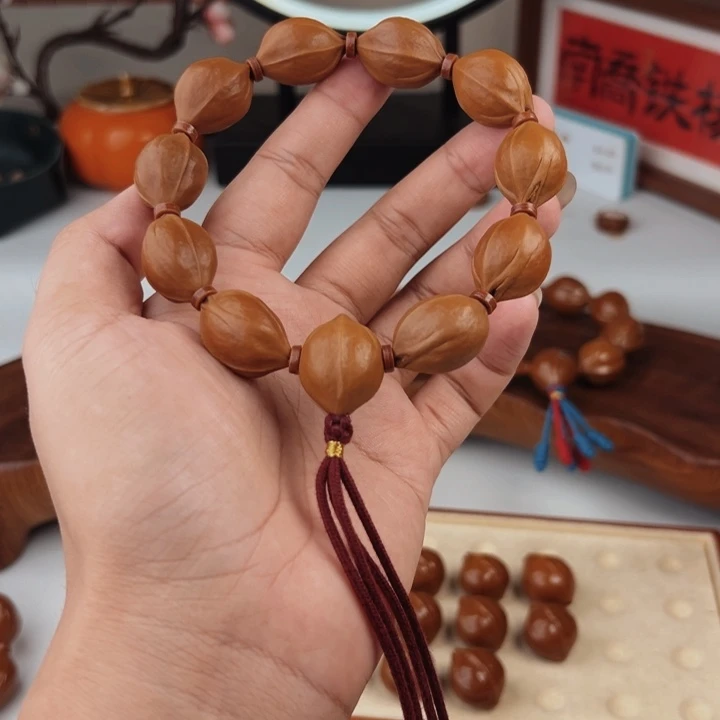 ƪ***雅橄榄核手串17×24鲨鱼背