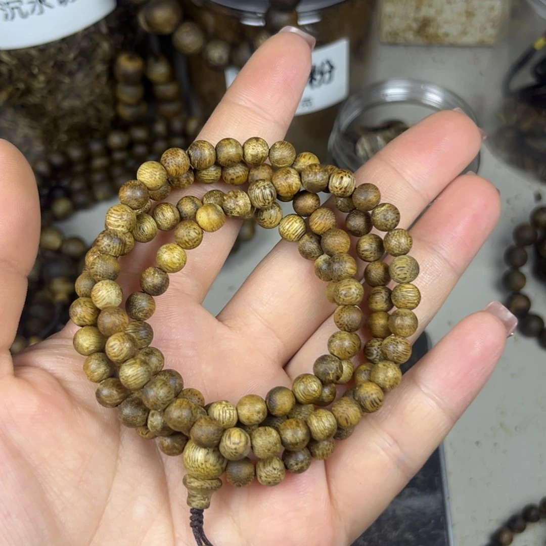 沉香碎屑沉香乌身九九沉0.6多圈