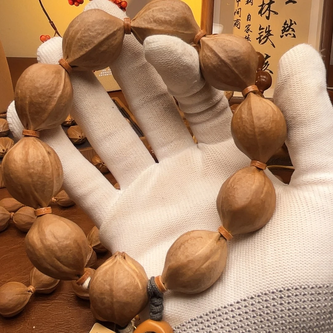 俊***哥橄榄核手串梅林铁核21*27