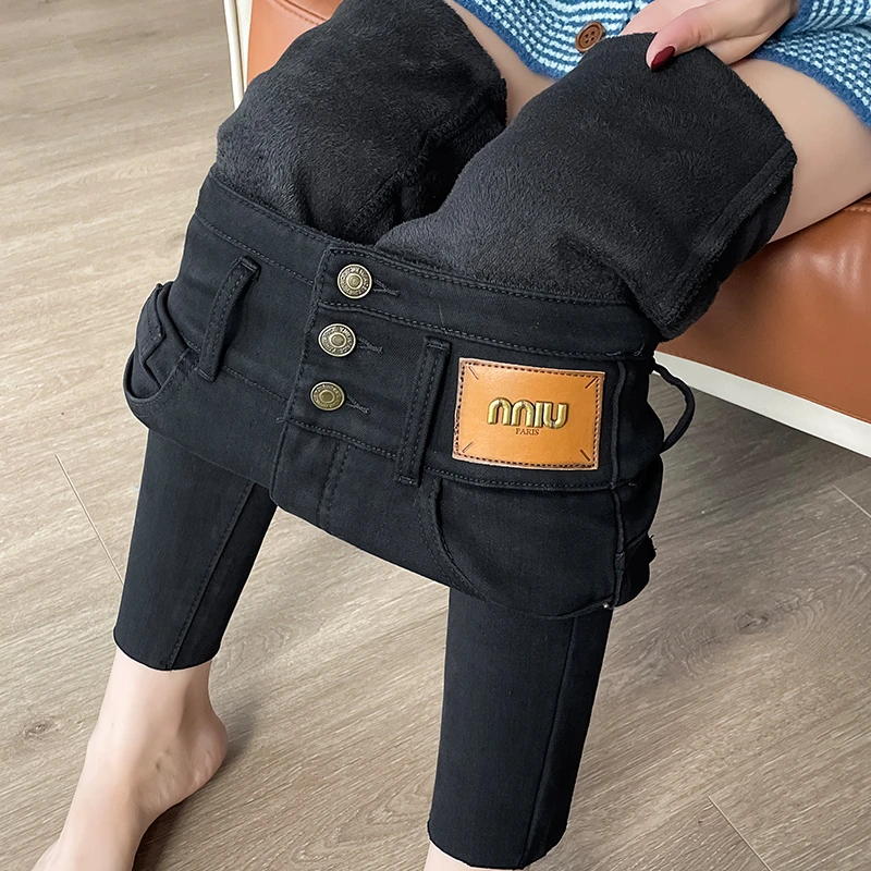 蜜蜜穿搭黑色加绒小脚牛仔裤女2025冬辣妹包臀提臀打底加厚铅笔裤