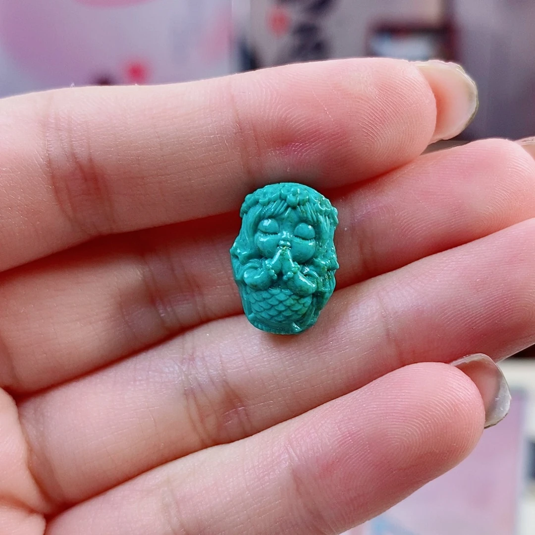 杨***刘未镶嵌绿松石珠宝奇石