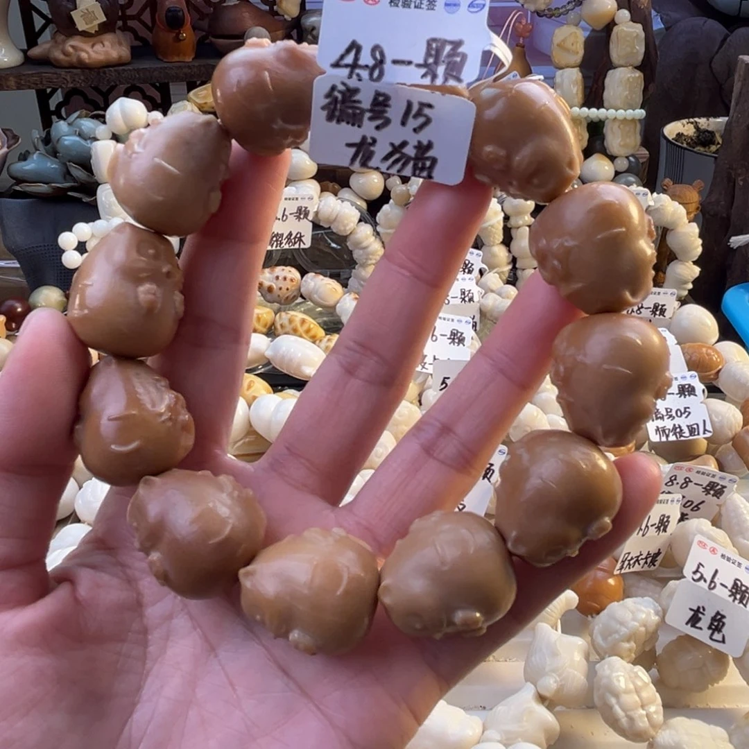 菩提根/象牙果手串-编号15微瑕龙猫4.8/颗-成品12颗-满18飞