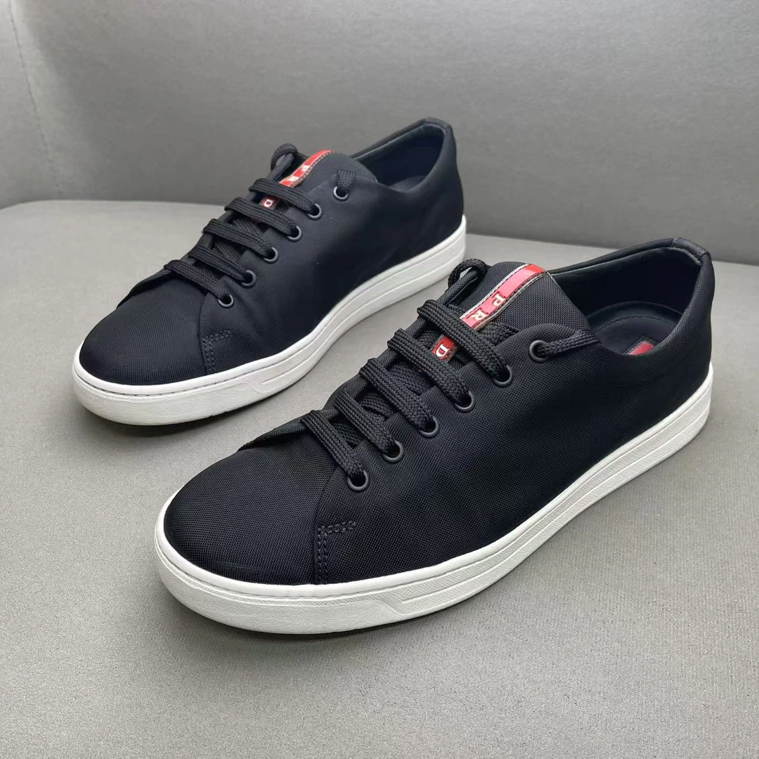 95新 Prada/普拉达 黑色时尚百搭舒适网面透气红标板鞋 42码