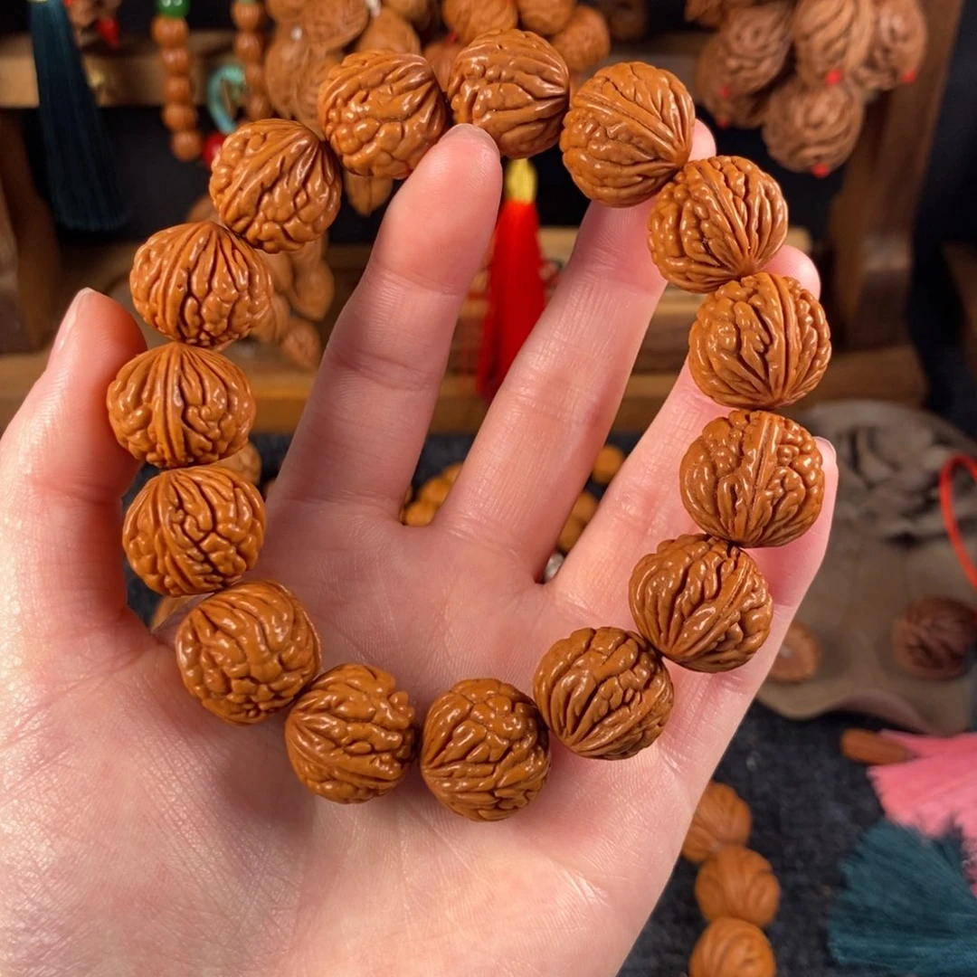 吊坠桃核桃枭手串