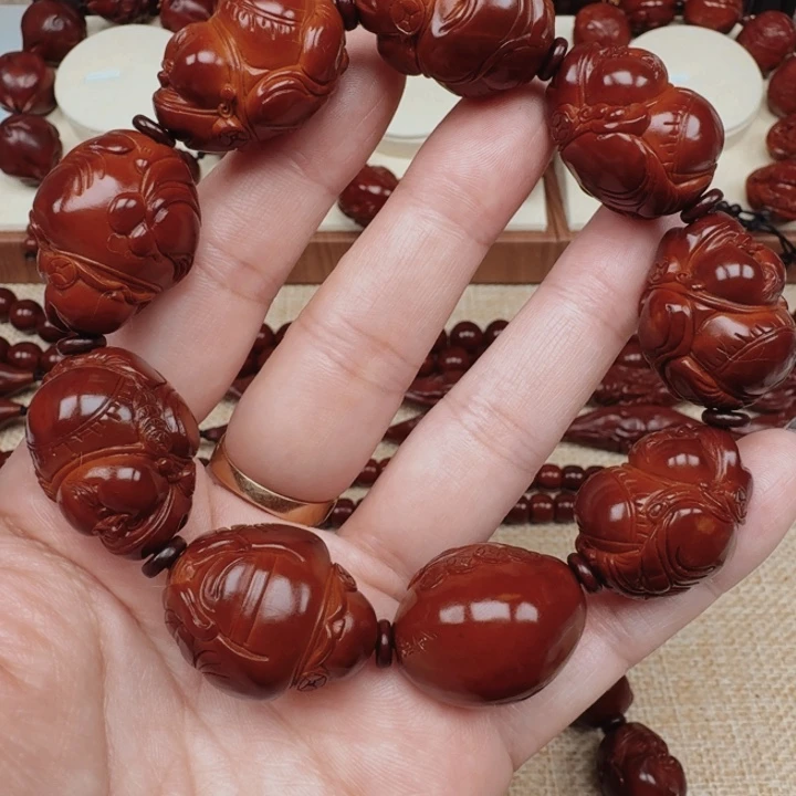 久****）橄榄核精品海派财神