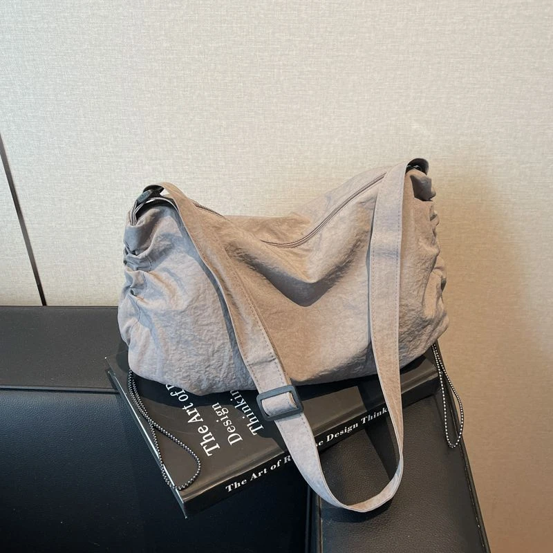 日系防水尼龙饺子包运动挎包男女大容量托特包骑行松弛感单肩包ZF