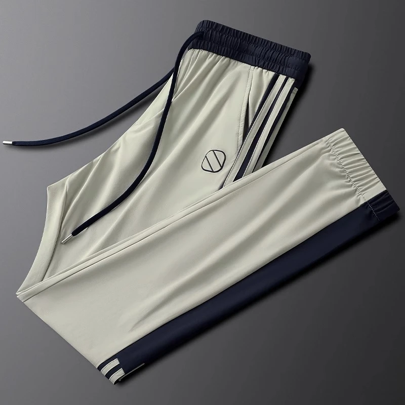 休闲运动裤男夏季薄款浅卡其色冰丝速干侧条纹修身弹力男士束脚裤