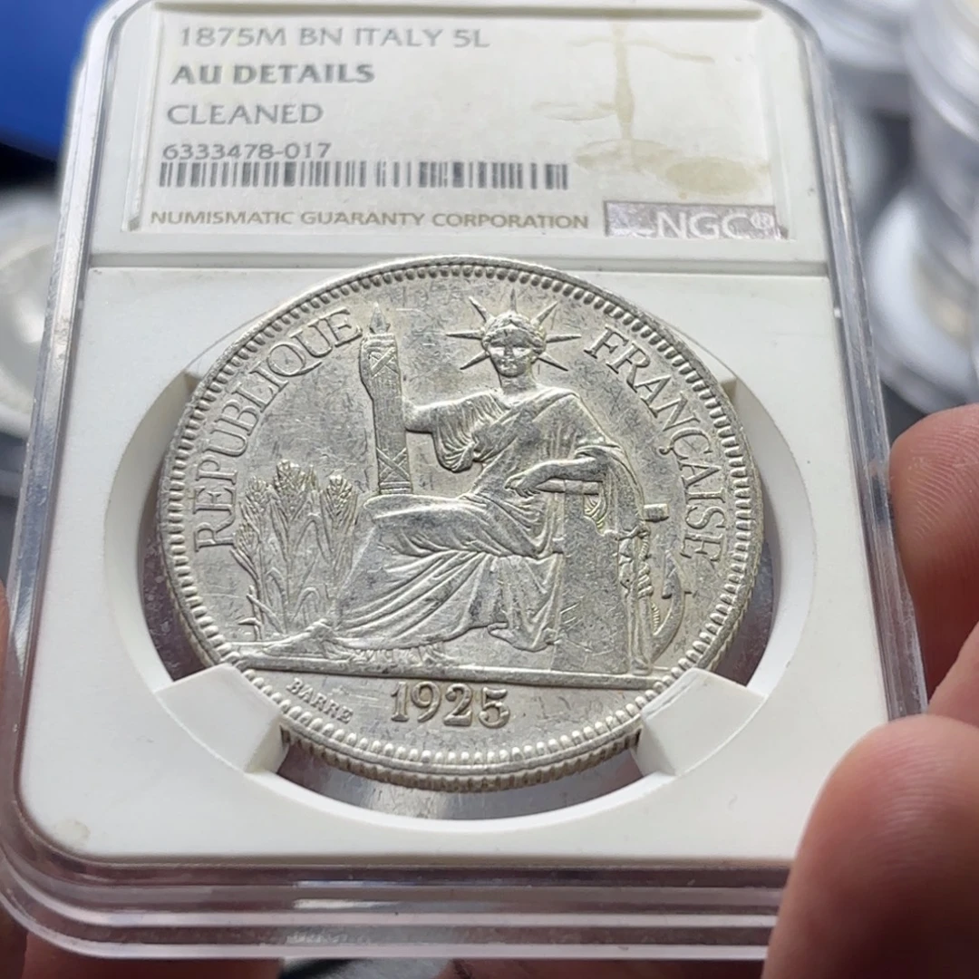 银Ag900坐洋1925年银币