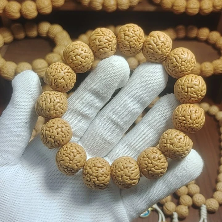 桃核吊坠佛肚手串
