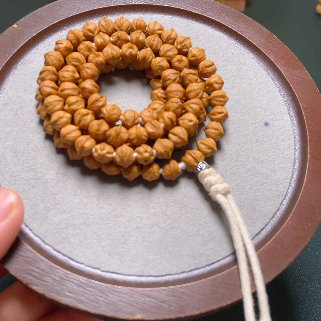 吊坠柏香籽/百香籽白牙横打长串