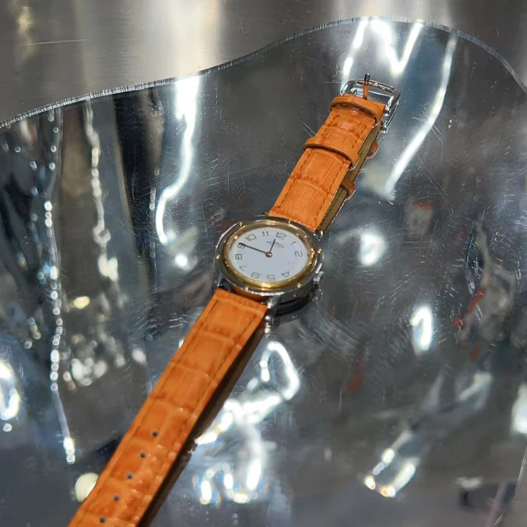 95新 Hermes/爱马仕 HERMES 爱马仕 橘色 压纹 皮带手表/0047
