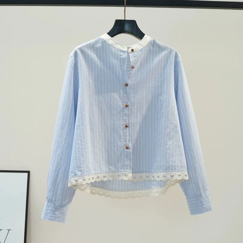 白色立领拼接蓝色条纹衬衫女春季新品下摆镂空刺绣花边宽松棉衬衣