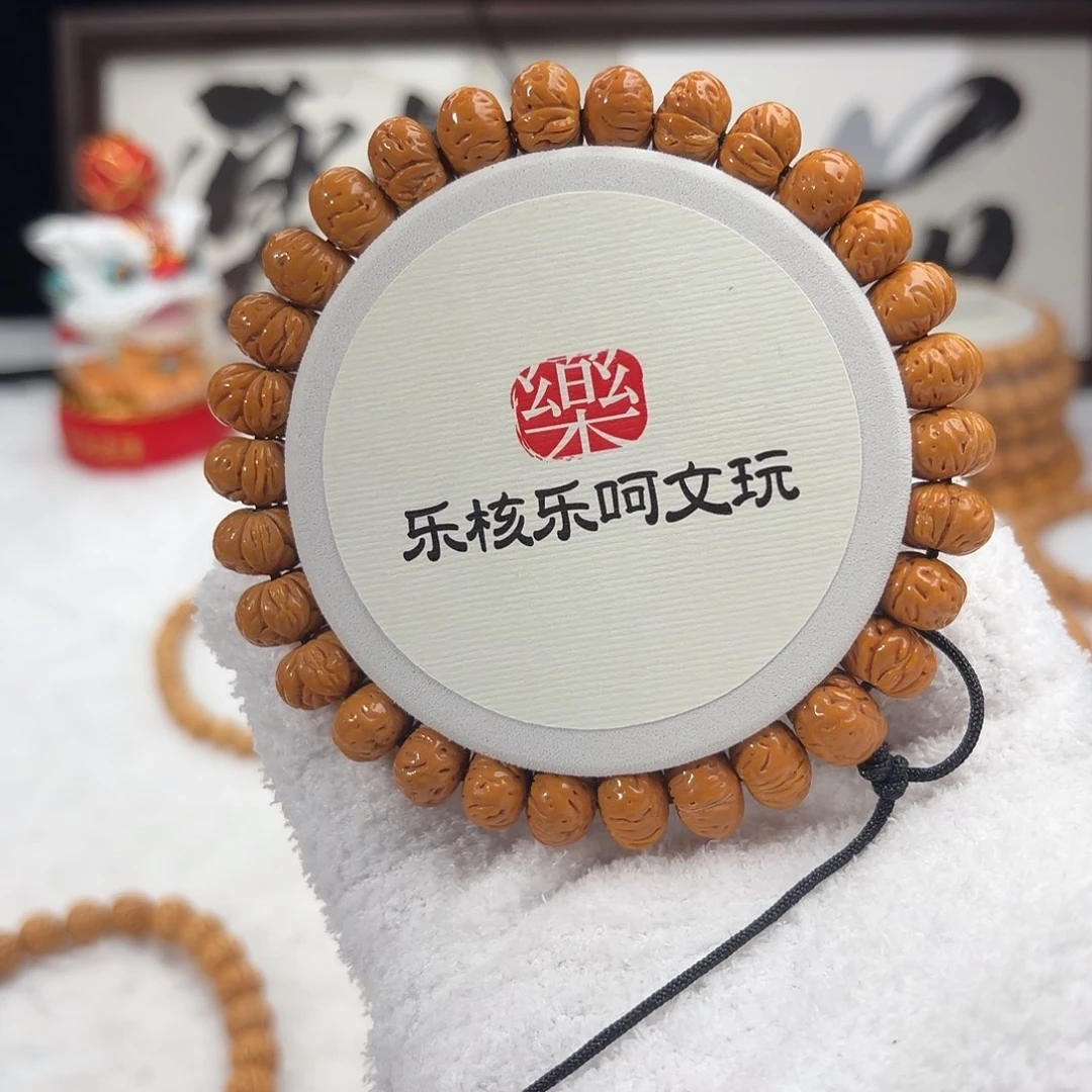 桃核手串1.2加「玉麒麟」野生蟠桃手持