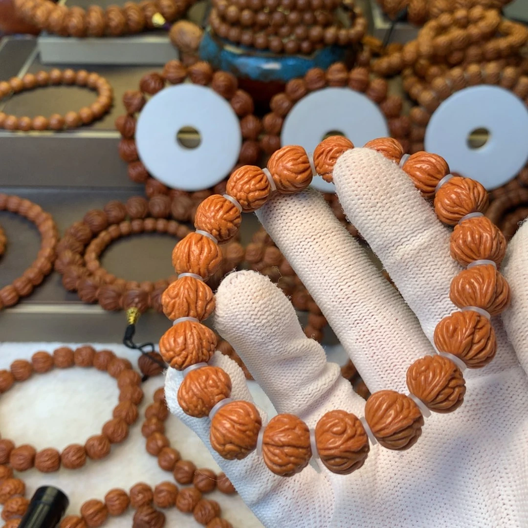 梁***美桃核手串秦岭龙纹