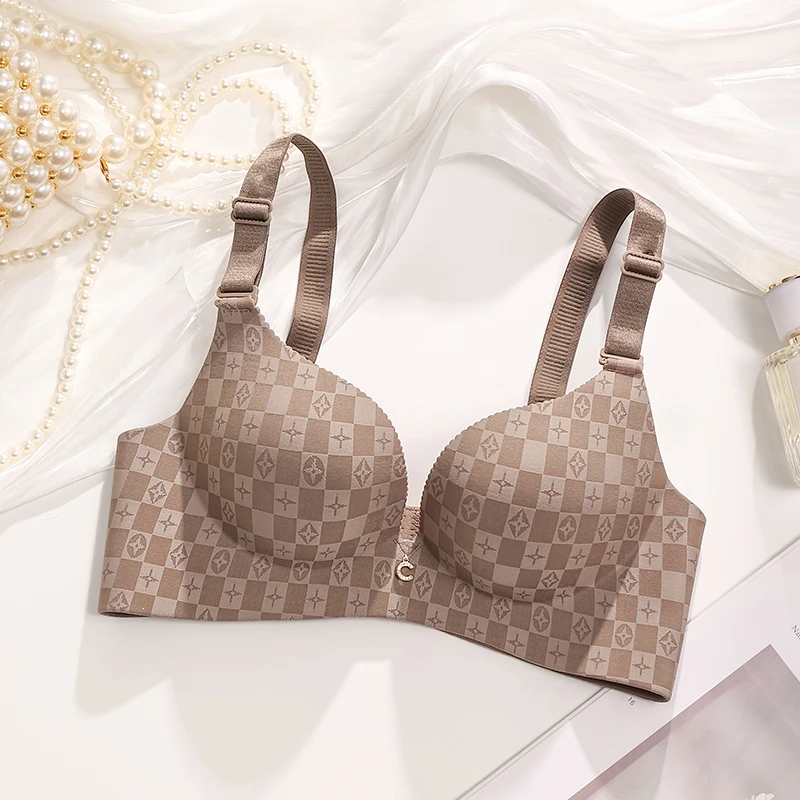 维多利亚馒头杯一片式性感无痕内衣无钢圈小胸聚拢显大加厚文胸罩