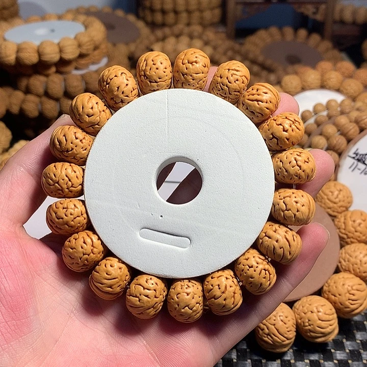 、***升手串桃核11#树王纽扣