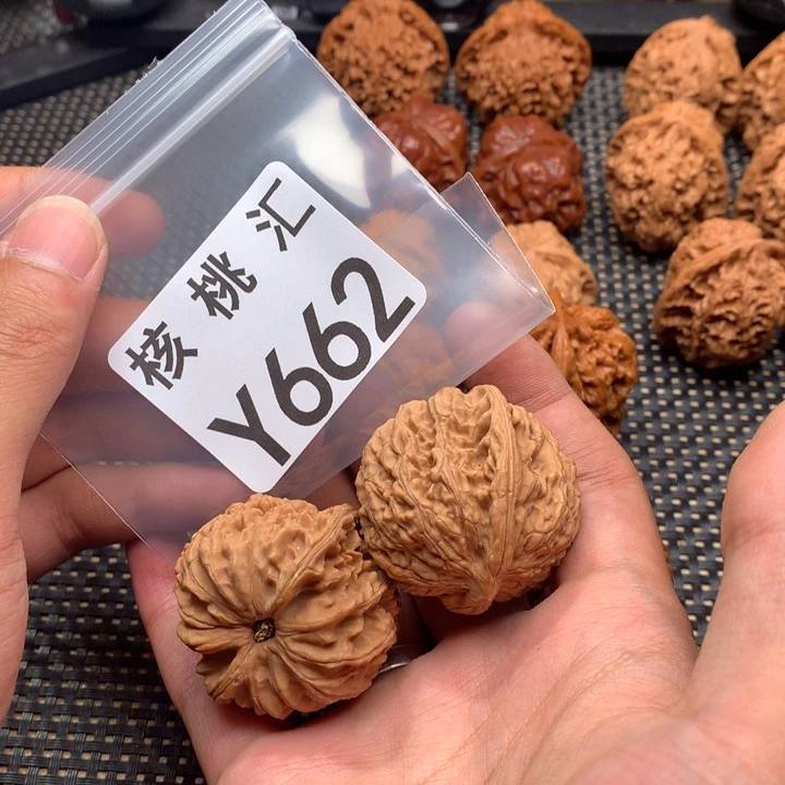 文玩核桃吊坠四喜