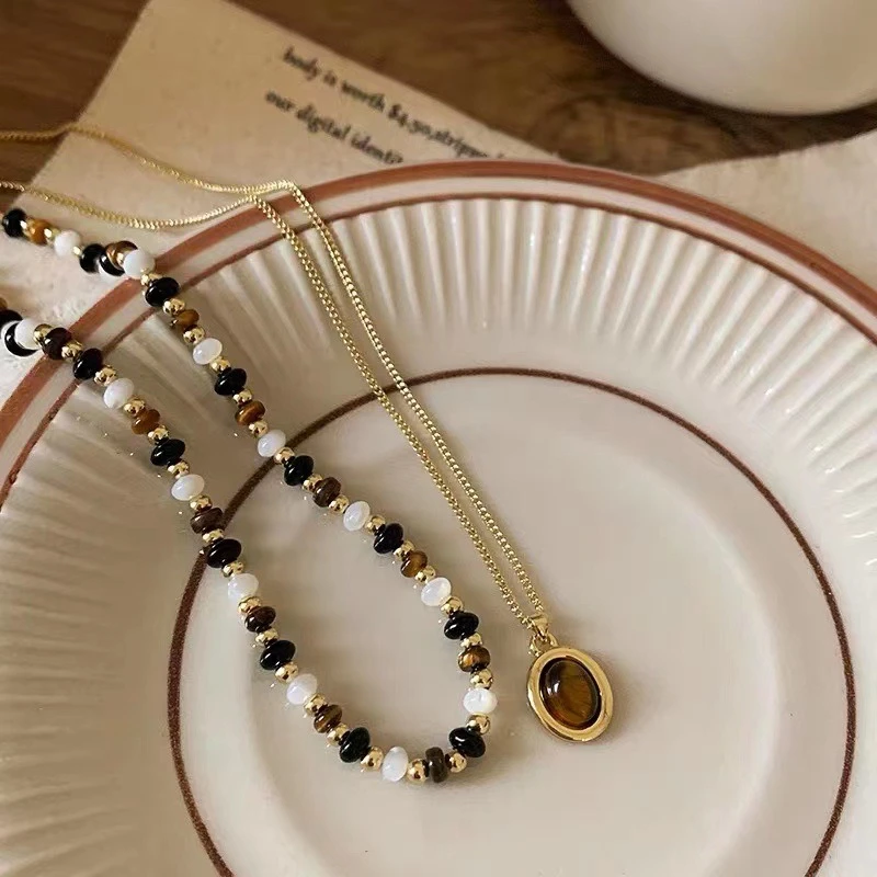 樊尼娅 合金吊坠 气质双层叠戴秋冬美拉德串珠虎眼石复古毛衣链