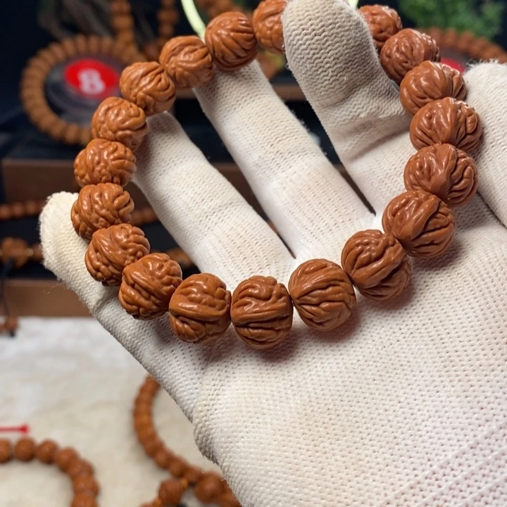 桃核吊坠老****j秦岭龙纹桃核