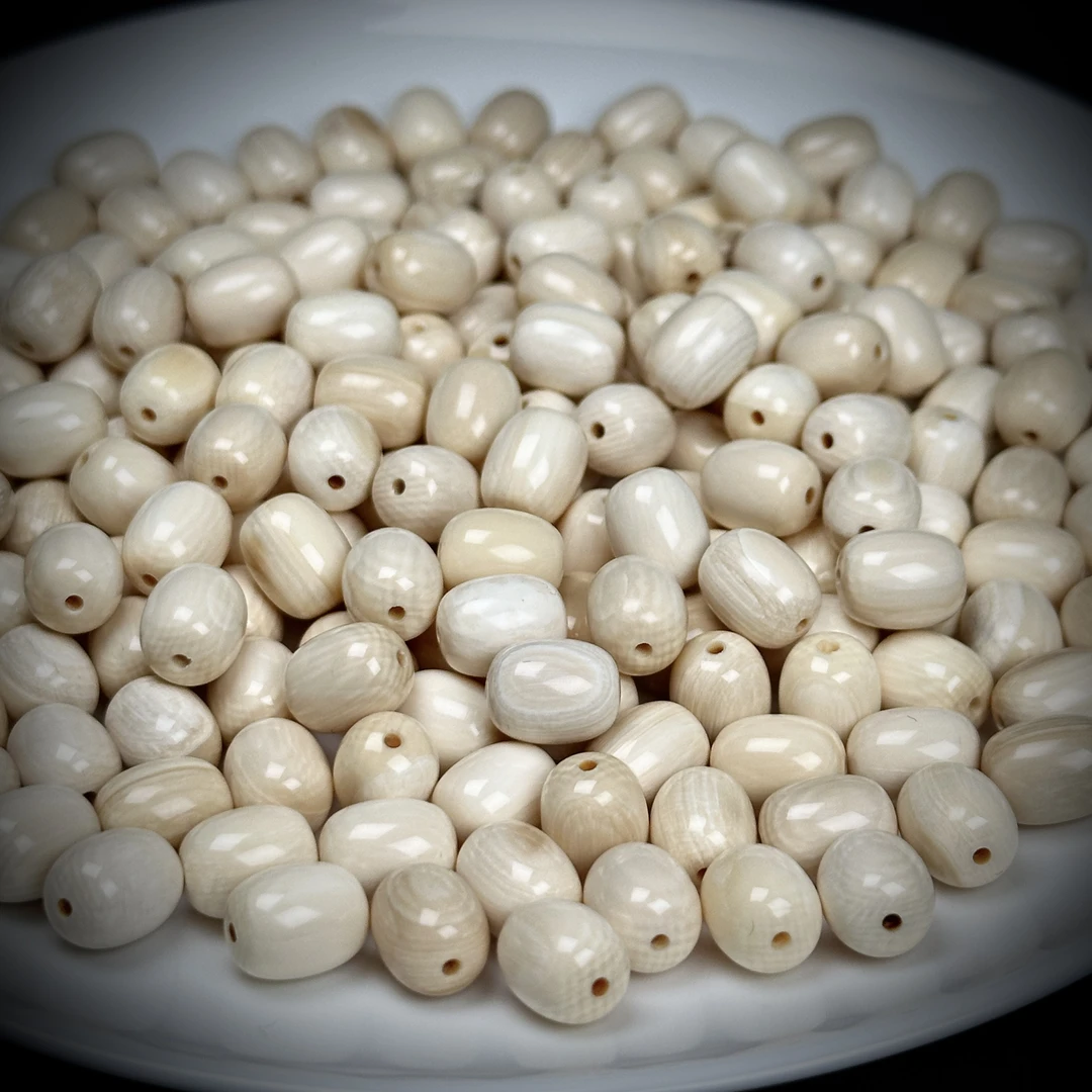 A140天然猛犸牙芝士皮桶珠 约8*10mm随机一个 支持鉴定 假一罚四
