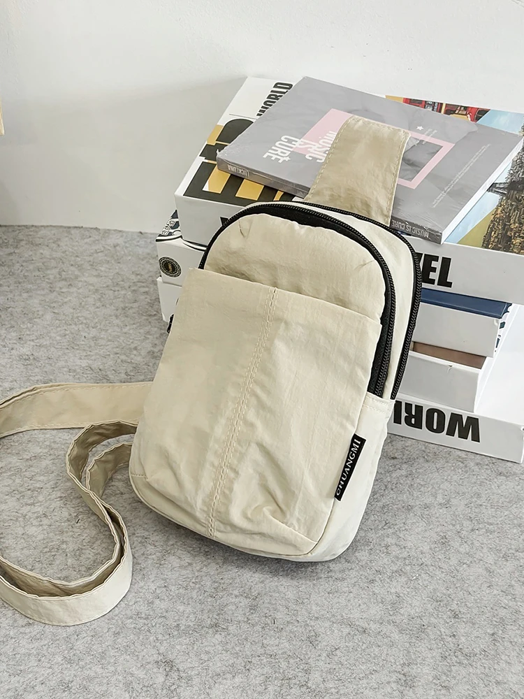 时尚马卡龙色尼龙包斜挎包胸包男女通用潮包小包包