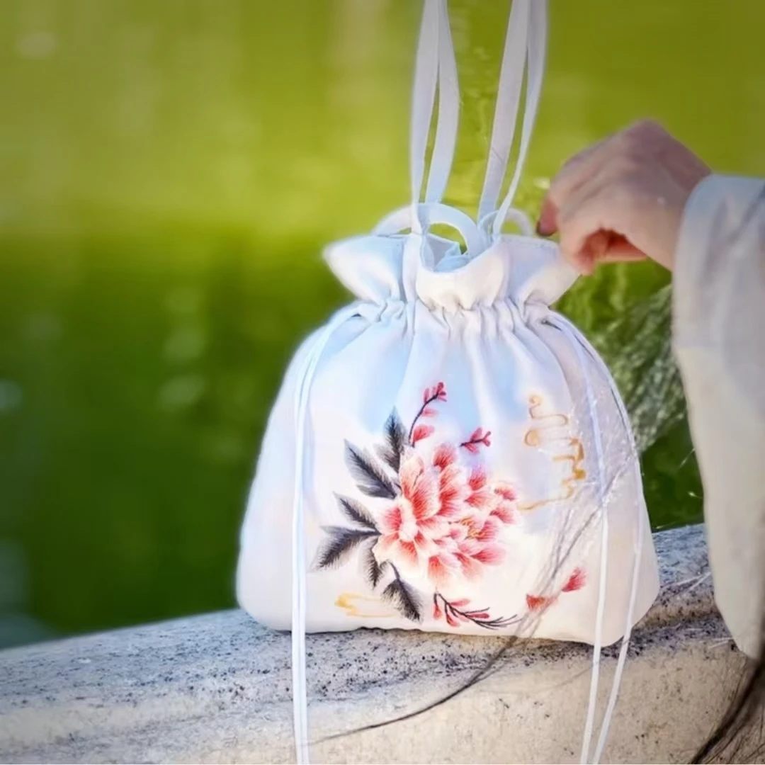 1（宽22高22厘米）流苏刺绣抱抱国风抽绳手提斜挎包手机包