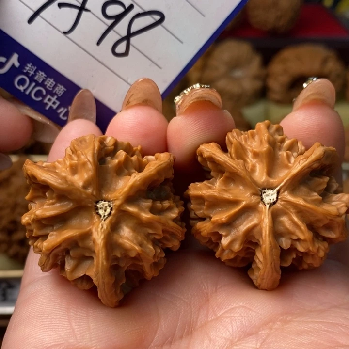 閑***人把件桃核三棱三棱