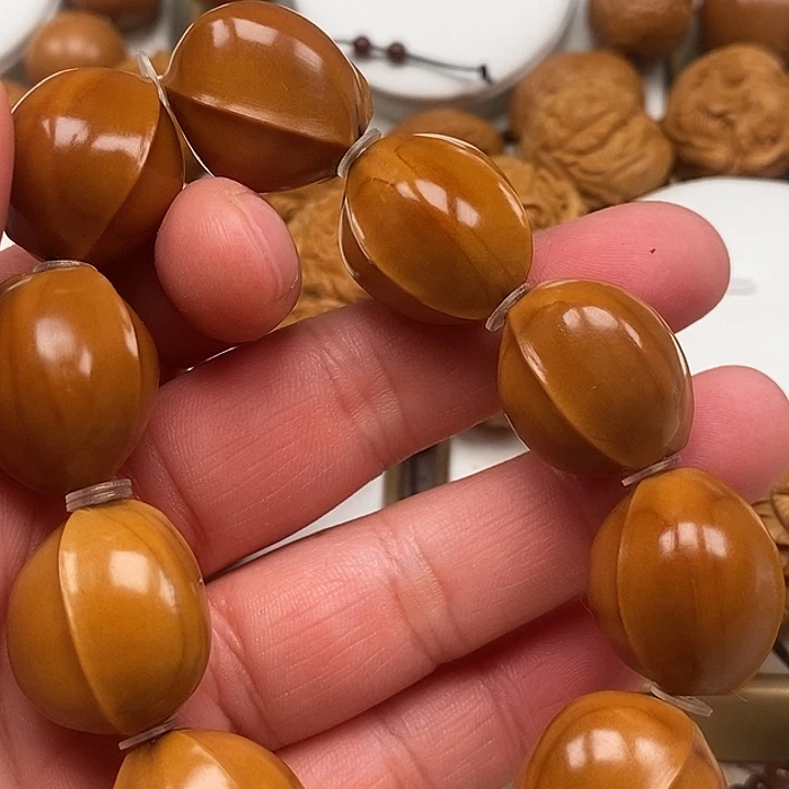 知***足吊坠橄榄核橄榄核