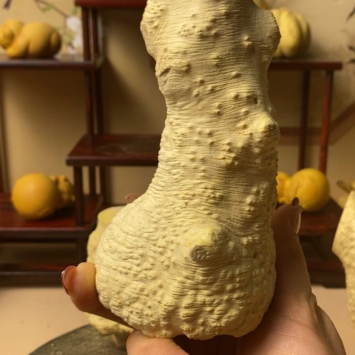香榧木彭****部黄杨木手把件