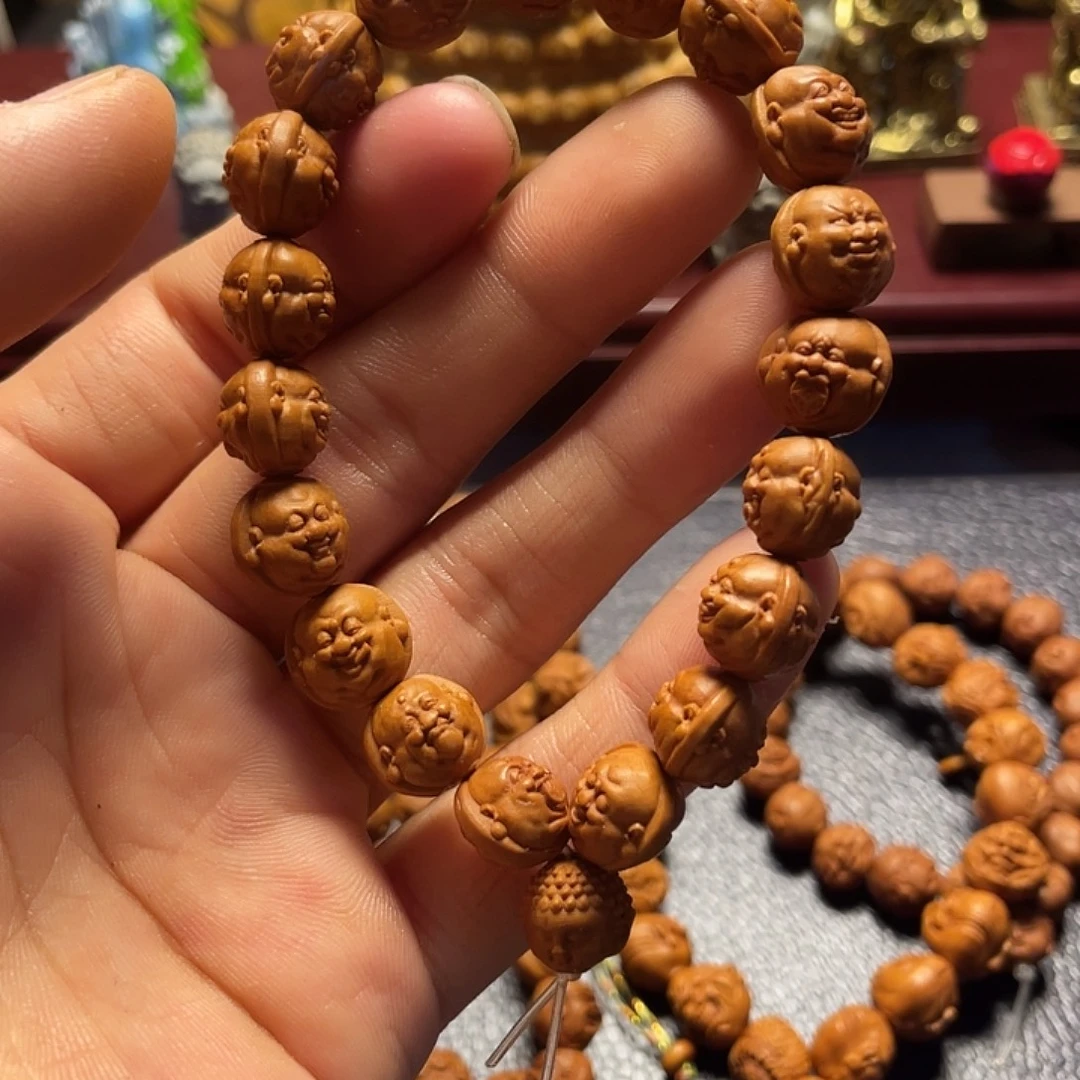 龙纹桃核雕刻双面百态