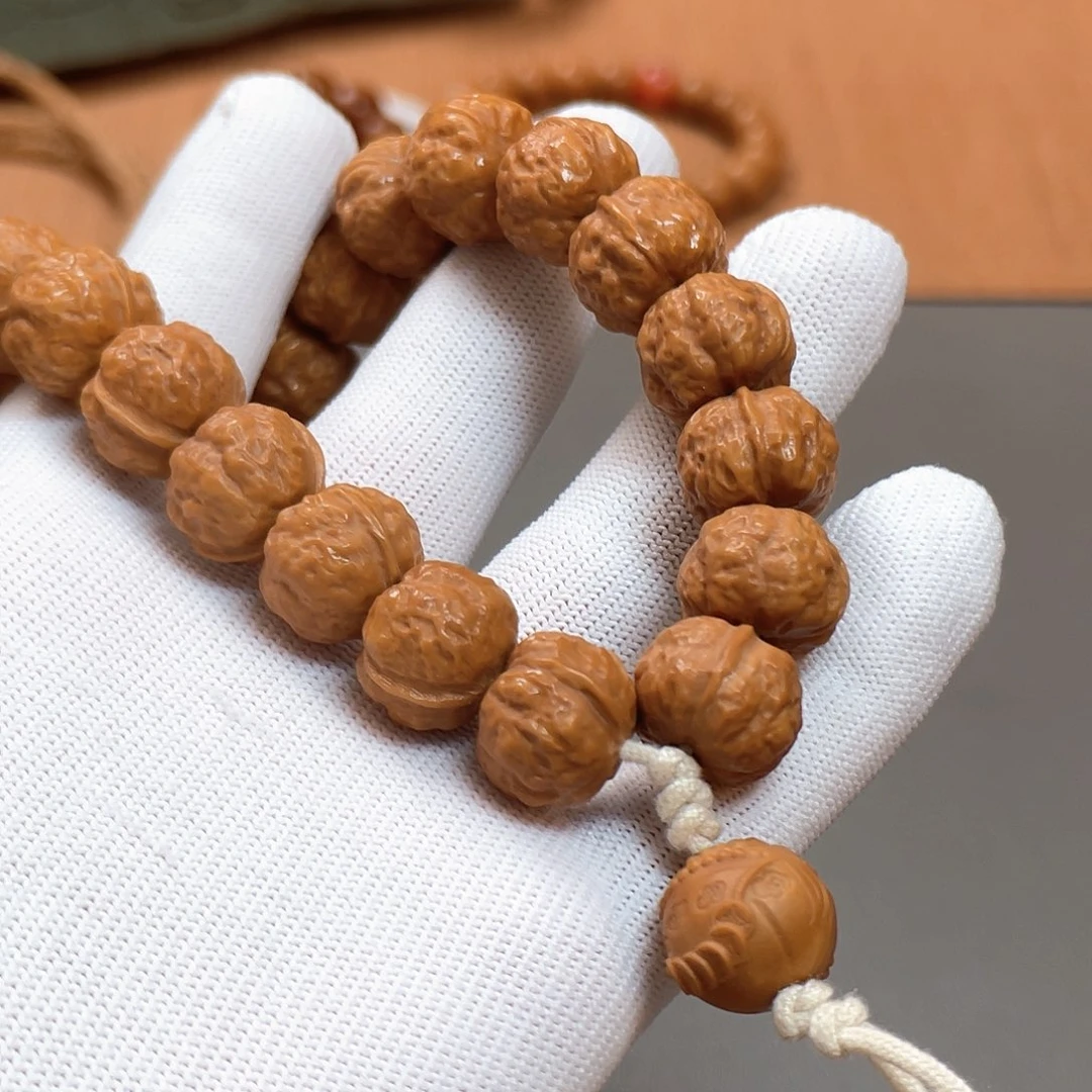 桃核把件C****n蟾宗手持