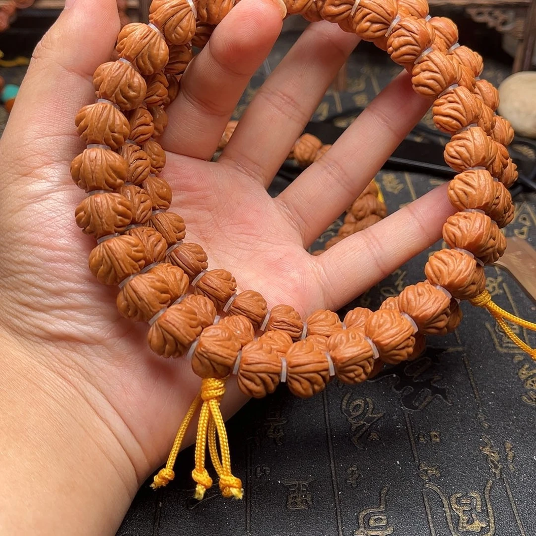 吊坠桃核双龙手持