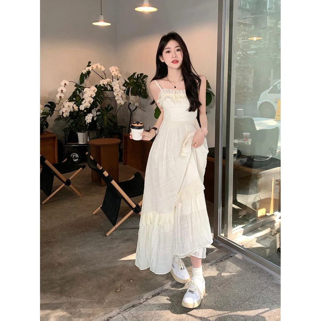 木耳边吊带连衣裙女夏季2024新款甜美法式收腰显瘦设计感超仙长裙