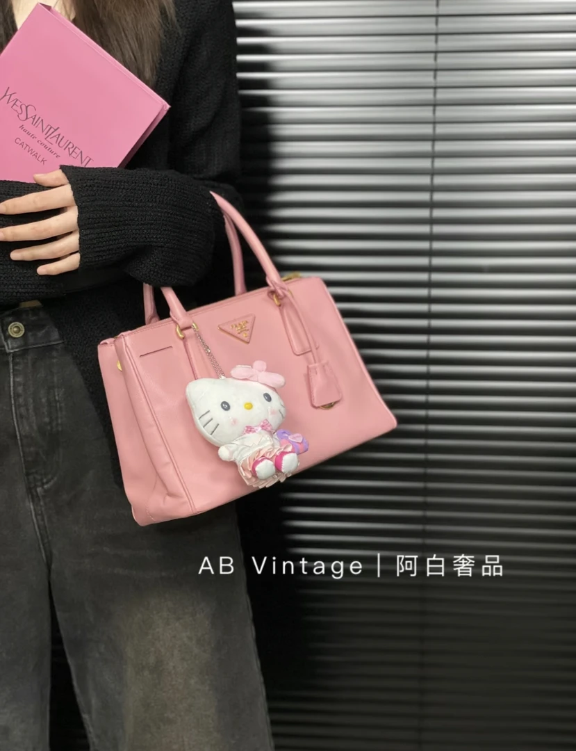 95新 Prada/普拉达 阿白奢品/ 普拉达 粉色小号杀手包