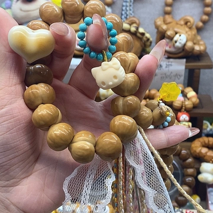 阳***麻猴头核桃手串屁桃爱心猫头