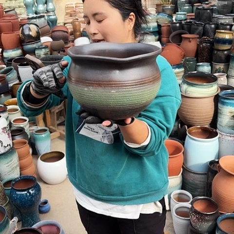 口25高18瑕疵一个盆子。